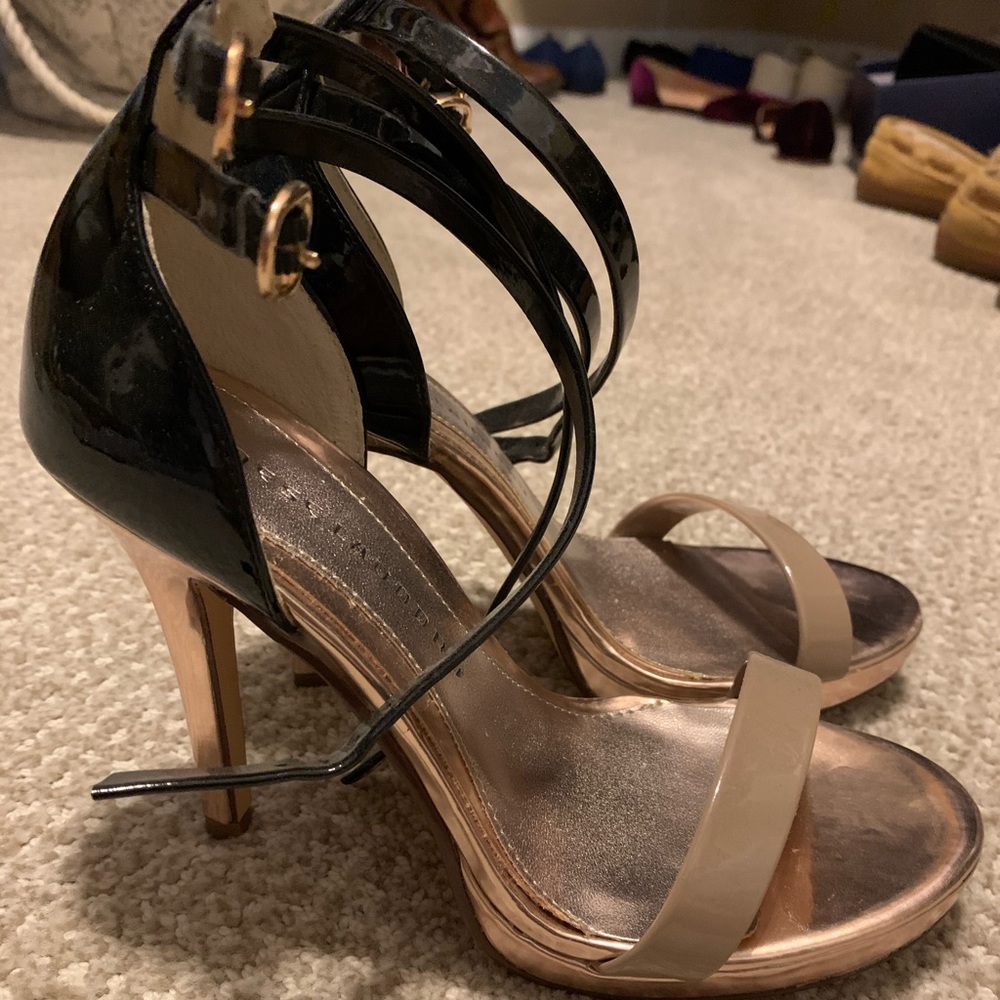 Black, tan, and rose gold heels